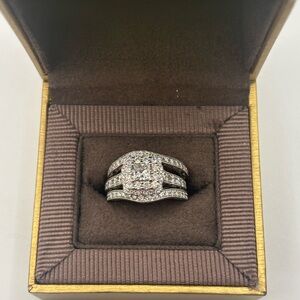 Neil Lane Diamond Ring all 3 are size 7
 1- 3/8 ct 14K WG & 14K diamond Bands